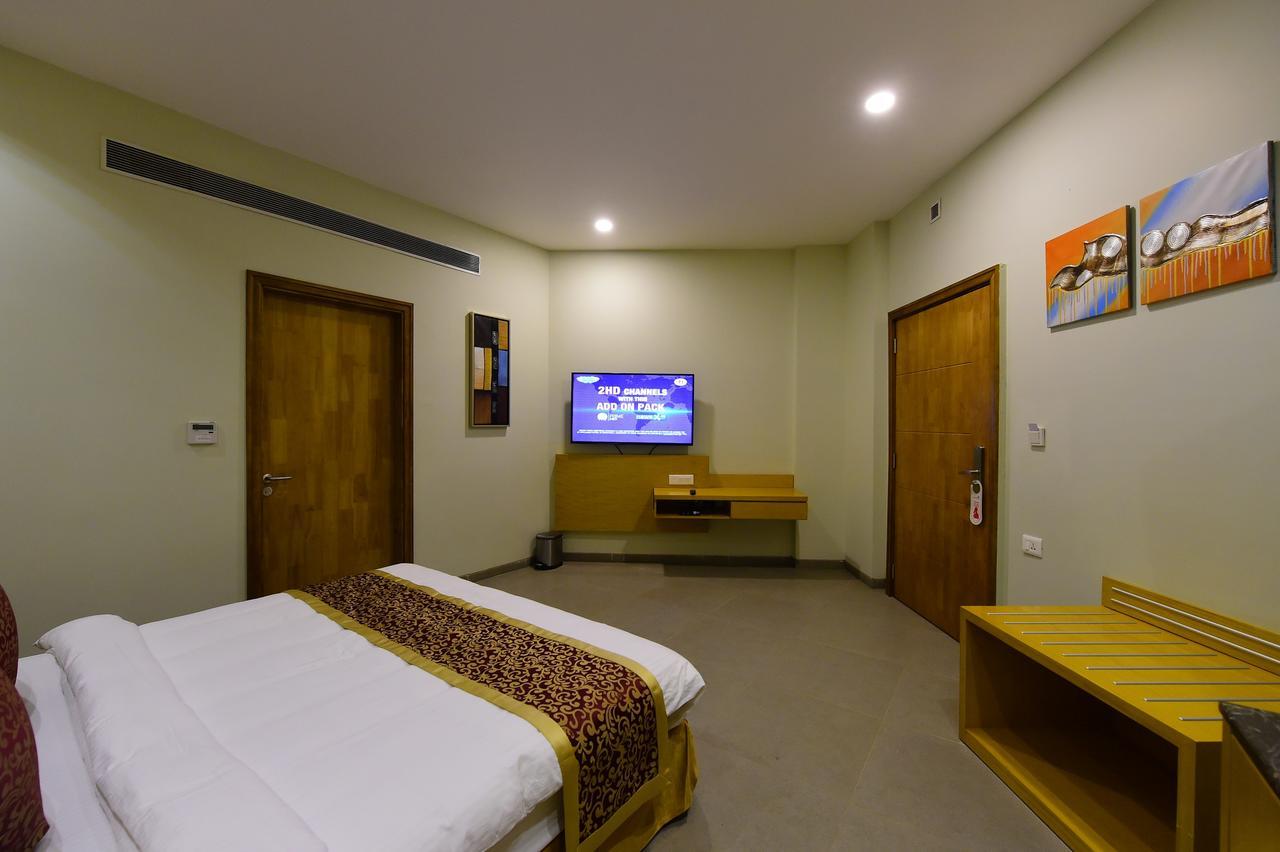 Hotel H - Sandhill Hotels Private Limited Anand Ngoại thất bức ảnh
