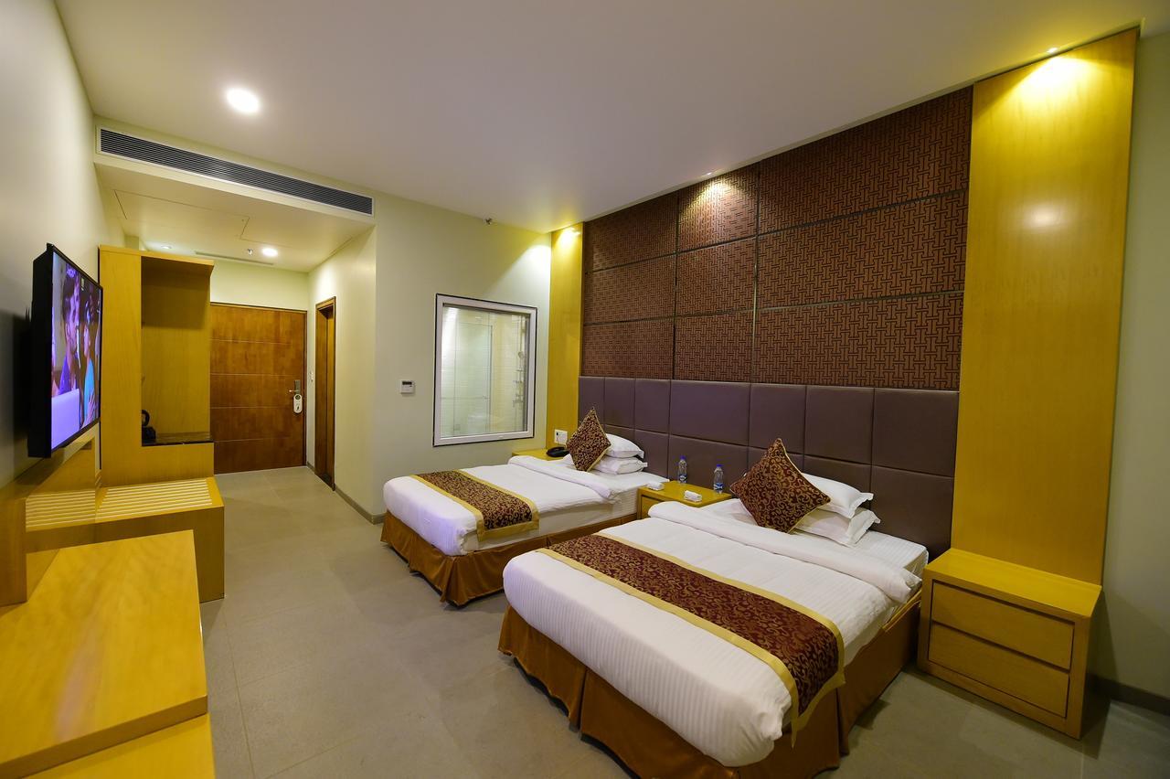 Hotel H - Sandhill Hotels Private Limited Anand Ngoại thất bức ảnh